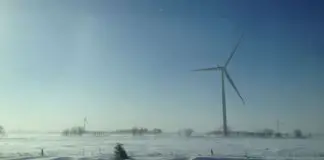 snowy wind turbines in Canada